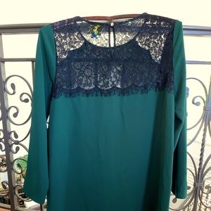 Classy knee length Cece green and lace sheath